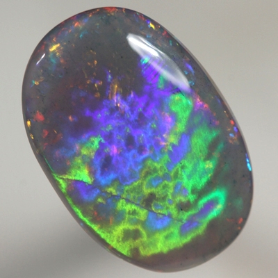 SOLID SEMI BLACK OPAL Large rolling flash of green and blue over sparkling red and orange See video